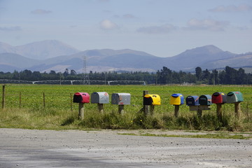 Mailboxes at a road crossing, in the middle of nowhere