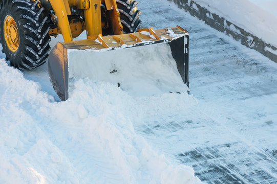  Snow Clearing. Tractor Clears The Way After Heavy Snowfall.