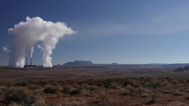 Steam and Smoke from Desert Power Plant