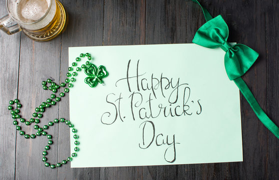 Happy St Patrick day calligraphy card on black