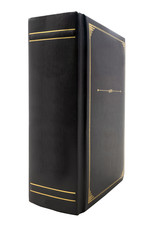 Spine and cover of thick black book, Isolated. Vertical.