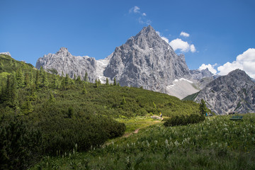 Fototapeta premium Mountain hiker in alpine landscape, Austria