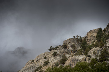 Fototapeta na wymiar Desolate Peaks and Clouds near Lundy Lake, Sierra Nevadas