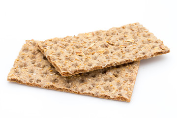 Stack of wholegrain crispy bread with sunflower, chia and sesame