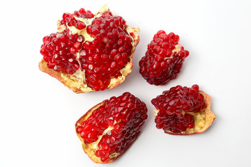 glass of red wine and bottle with grapes on a white background