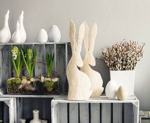 Simple, modern Easter decoration with hyacinth bulbs and pussy willows