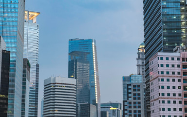 Obraz premium Group of modern skyscraper buildings. In the central business area in Sudirman street, Jakarta, Indonesia, captured in afternoon