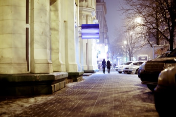 Obraz premium Blurred background. people walking through city street.