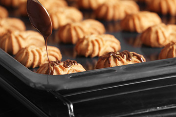 Delicious cookies on baking tray