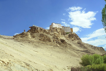 Fototapeta na wymiar Thiksay Gompa or Thiksay Monastery (alsoTikse, Tiksey or Thiksey) - gompa (monastery) located on top of a hill in Thiksey village in Ladakh, India 