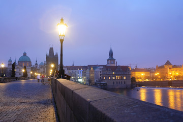 Naklejka premium Prague, Czechia - November, 21, 2016: Charles Bridge in Prague, Czechia early in the morning
