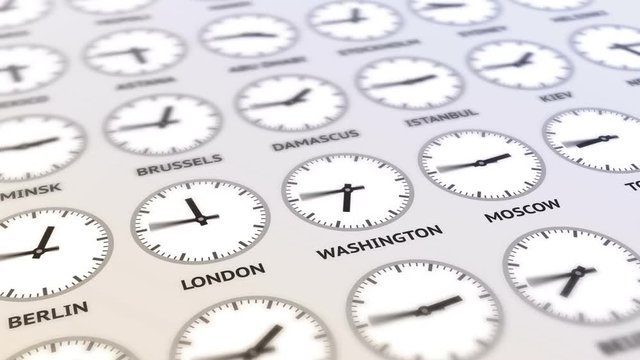 Round clocks are going and showing different time for different cities around the world. Time in capitals in different time zones. Geopolitics concept. Looped video. Tinted effect
