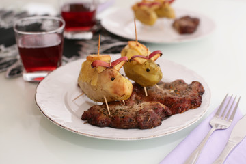 Decorative luxury food pork with funny potato pigs 