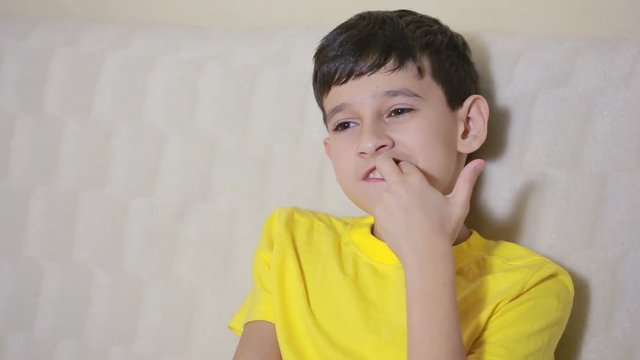 Boy biting his nails obsessive-compulsive disorder, child psychology