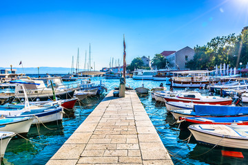 Town Bol city center. / View at sea port in mediterranean town Bol, Island Brac, croatian famous...