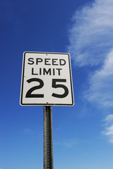 speed limit sign agasint blue sky
