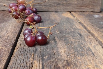 Grape red fresh Select focus with shallow depth of field on wooden table background