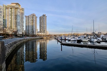 Seawall and boats in city marina. Yaletown. Cambie Bridge. False Creek.  Vancouver downtown. British Columbia. Canada.