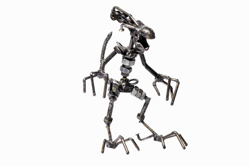 Children homemade toy made of metal. The layout of the metal monster.