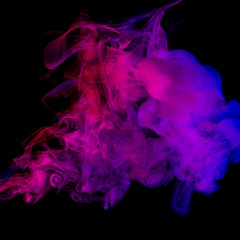 Abstract smoke Weipa. Personal vaporizers fragrant steam. The concept of alternative non-nicotine smoking. Purple pink smoke on a black background. E-cigarette. Evaporator. Taking Close-up. Vaping.