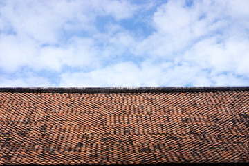 Beautiful roof of temple in thailand with blue sky