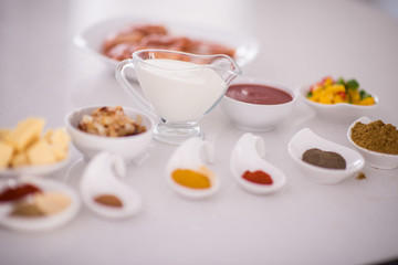Preparing food in modern white kitchen