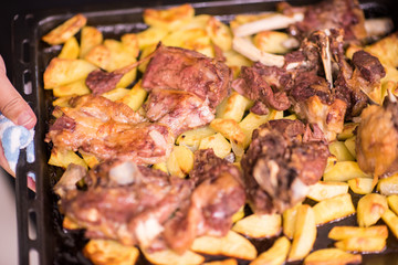 Chicken with potatoes closeup