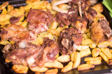 Chicken with potatoes closeup