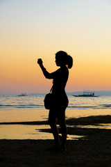 Fototapeta premium Woman Taking Photo Silhouette