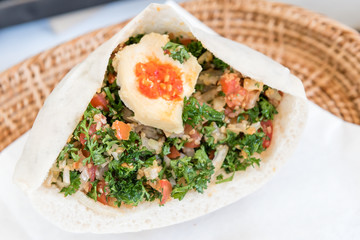 Lebanese pita bread stuffed with vegetarian ingredient