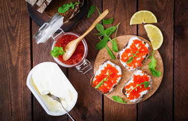 Sandwich with red caviar. Flat lay. Top view