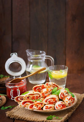 Pancakes with red caviar on plate. Russian cuisine. Maslenitsa