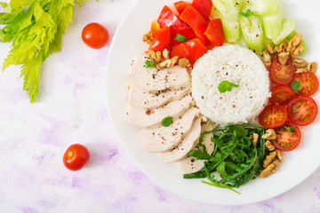 Diet food. Chicken breast with rice and vegetables. Healthy lifestyle. Sports nutrition. Flat lay. Top view