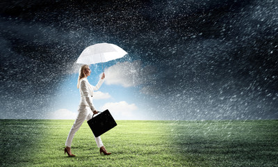 Businesswoman with white umbrella . Mixed media