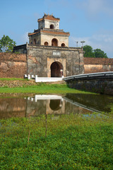 One of ancient gate with a bastion of a citadel of the city of Hue. Vietnam