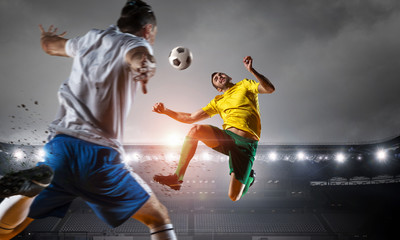 Obraz na płótnie Canvas Hot moments of soccer match . Mixed media