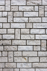 Fototapeta premium White bricks in layers as a cladding of a wall