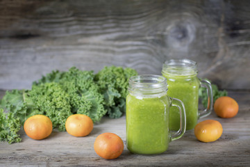 Nutritional smoothie of fresh organic curly green kale with tang