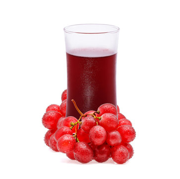 Glass of grape juice and grape