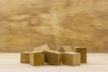 Pile of Wooden Blocks on wooden background