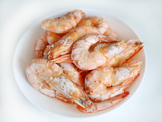 Baked salt shrimp on white dish