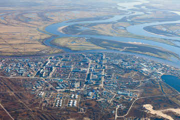 Aerial View of town on the bank river