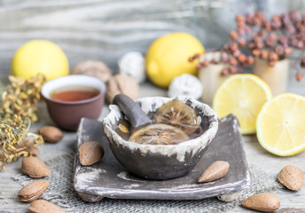 Delicious homemade antiviral lemon jam in unusual pottery brown