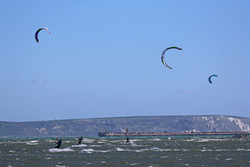 kitesurfers in Portland harbour