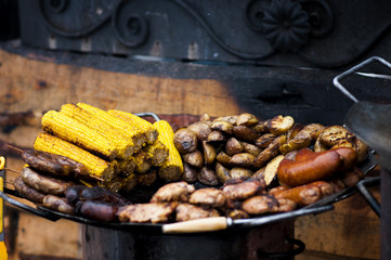 vegetables and meat cooked on the barbecue