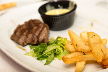 Steak with French Fries and Salad