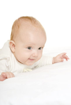 Adorable baby girl on blanket