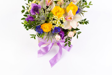 Bright buketny composition from fresh flowers, the white isolated background