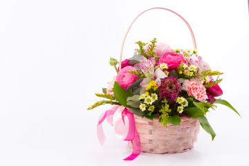 Bright buketny composition from fresh flowers, the white isolated background
