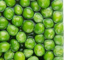 Border of wet fresh  green peas in water closeup on white background. Isolated. Healthy vitamin food.